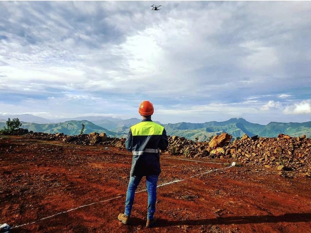 New-generation employee at work in a at the field with a client